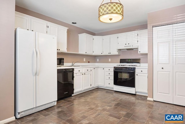 kitchen featuring pendant lighting, white cabinets, sink, and black appliances