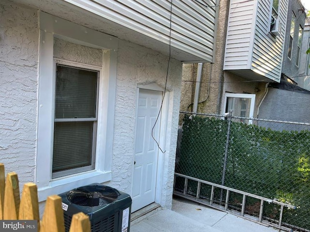 entrance to property with cooling unit