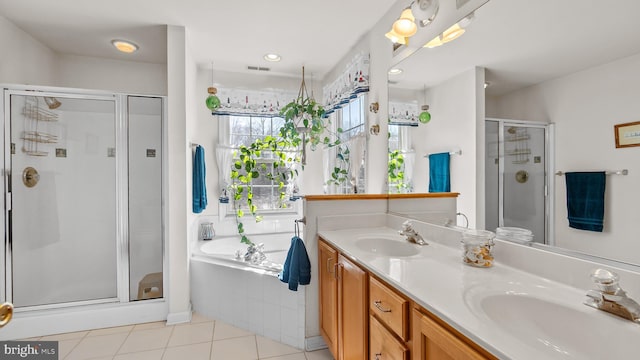 full bathroom with visible vents, a sink, a shower stall, and a bath