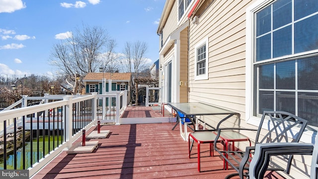 deck featuring a water view