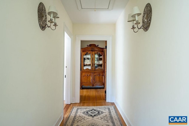 corridor featuring light hardwood / wood-style floors