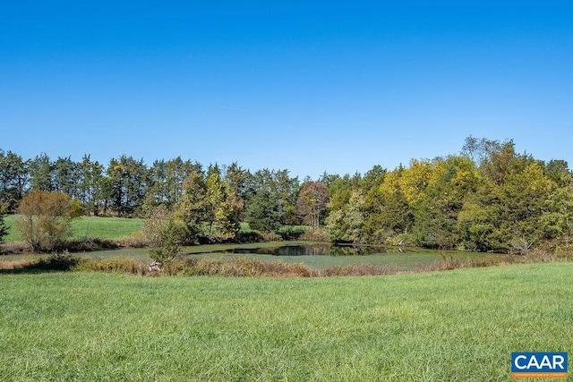 view of yard with a water view