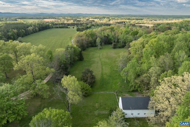 birds eye view of property featuring a rural view