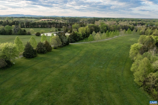 birds eye view of property featuring a rural view