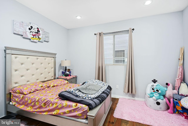 bedroom featuring dark wood-type flooring