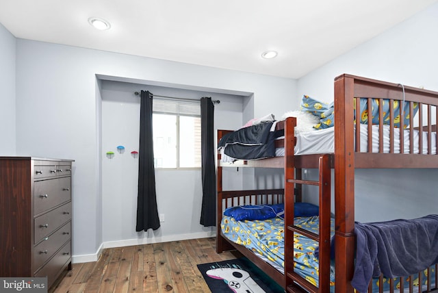 bedroom with hardwood / wood-style floors