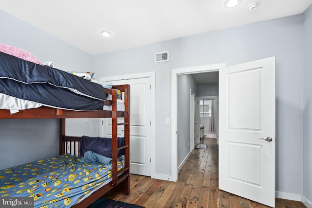 bedroom featuring hardwood / wood-style floors