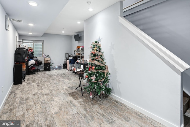 interior space with hardwood / wood-style floors