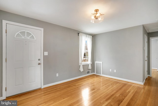 entrance foyer featuring light hardwood / wood-style floors