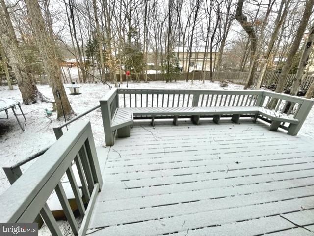 view of snow covered deck