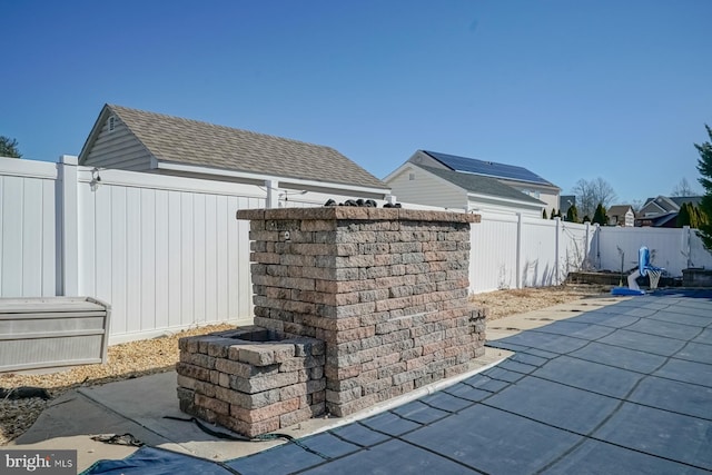 exterior space with a fenced backyard