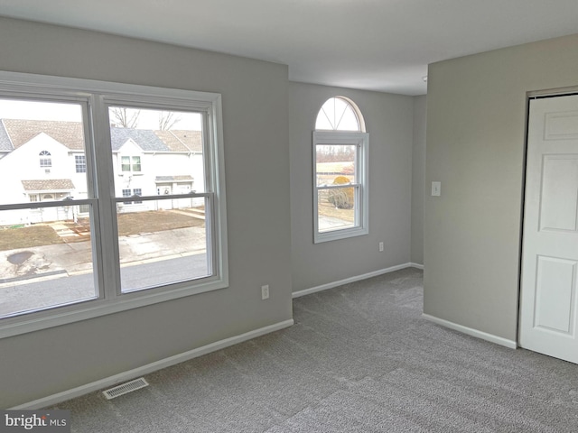 view of carpeted spare room