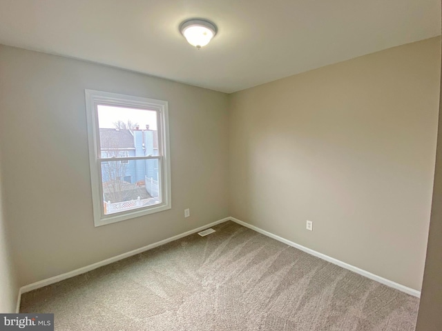 empty room featuring carpet