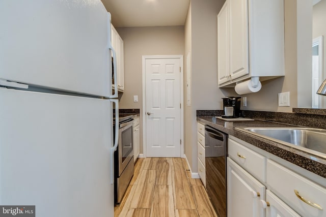 kitchen featuring white cabinetry, dishwasher, sink, white fridge, and electric stove