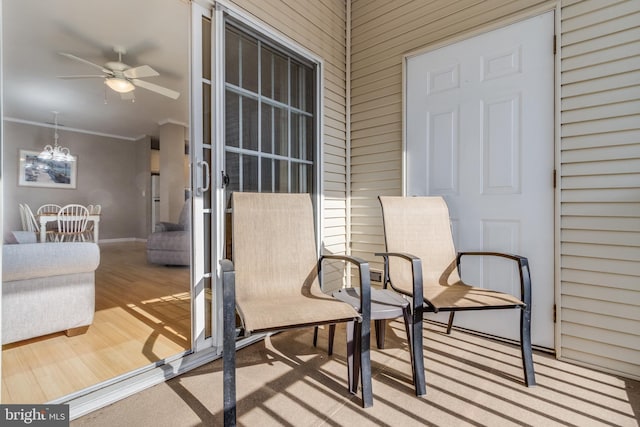 exterior space featuring ceiling fan