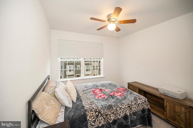 carpeted bedroom featuring ceiling fan