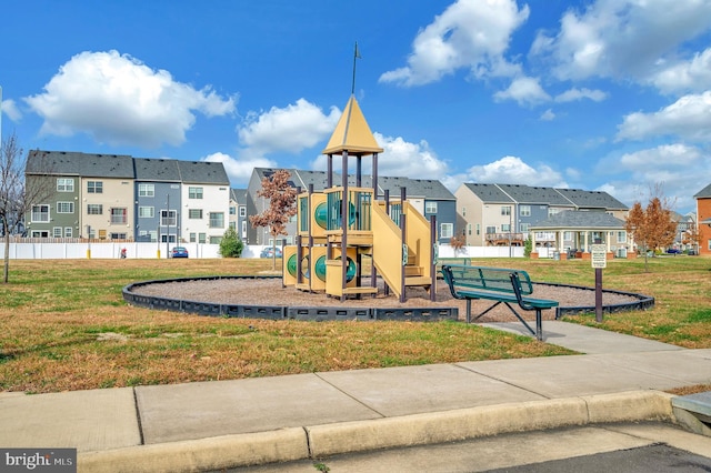 view of playground featuring a lawn