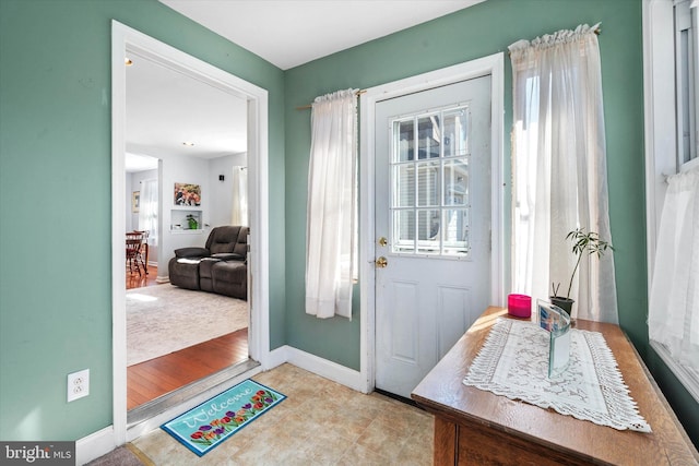 doorway with baseboards