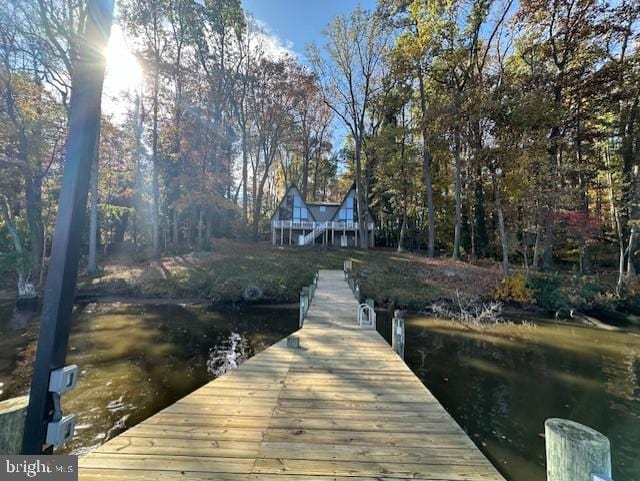 view of dock with a water view