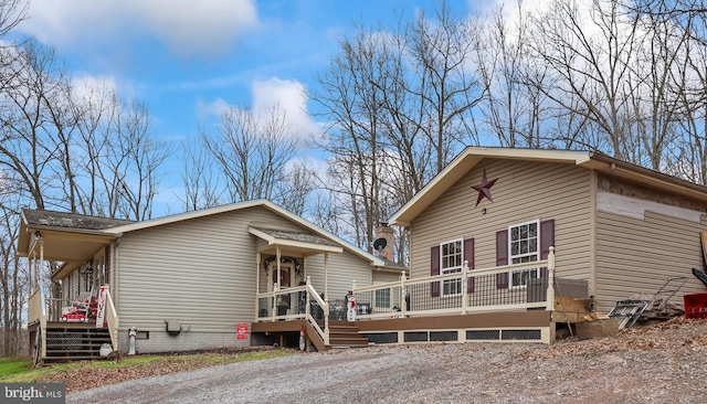 view of front of house featuring a deck