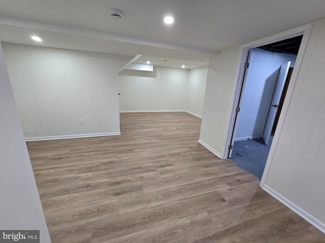 basement featuring light wood-type flooring