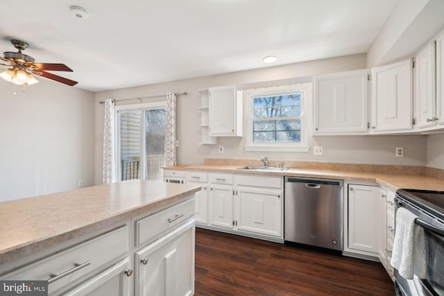 kitchen featuring white cabinetry, sink, stainless steel dishwasher, and electric range