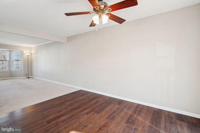 unfurnished room featuring hardwood / wood-style flooring, ceiling fan, and beamed ceiling