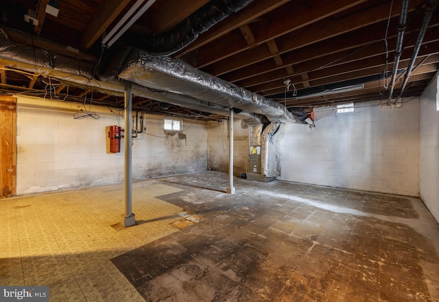 basement featuring heating unit