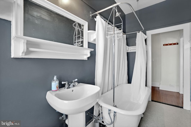 bathroom with sink and shower / bath combo