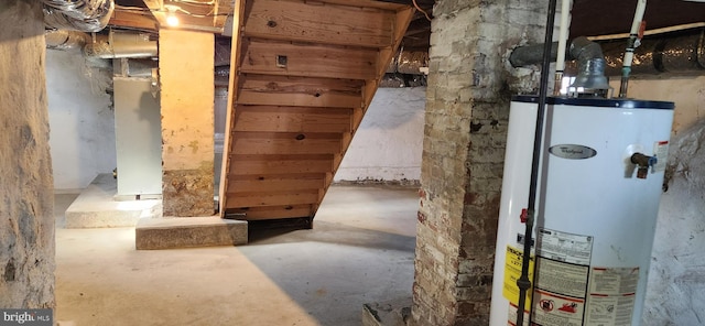 utility room with water heater