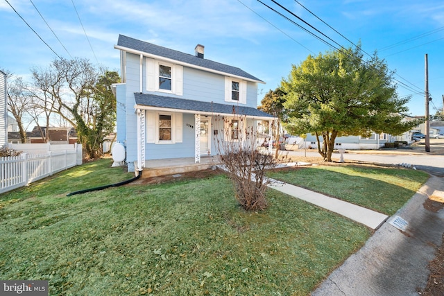 view of front facade with a porch and a front yard