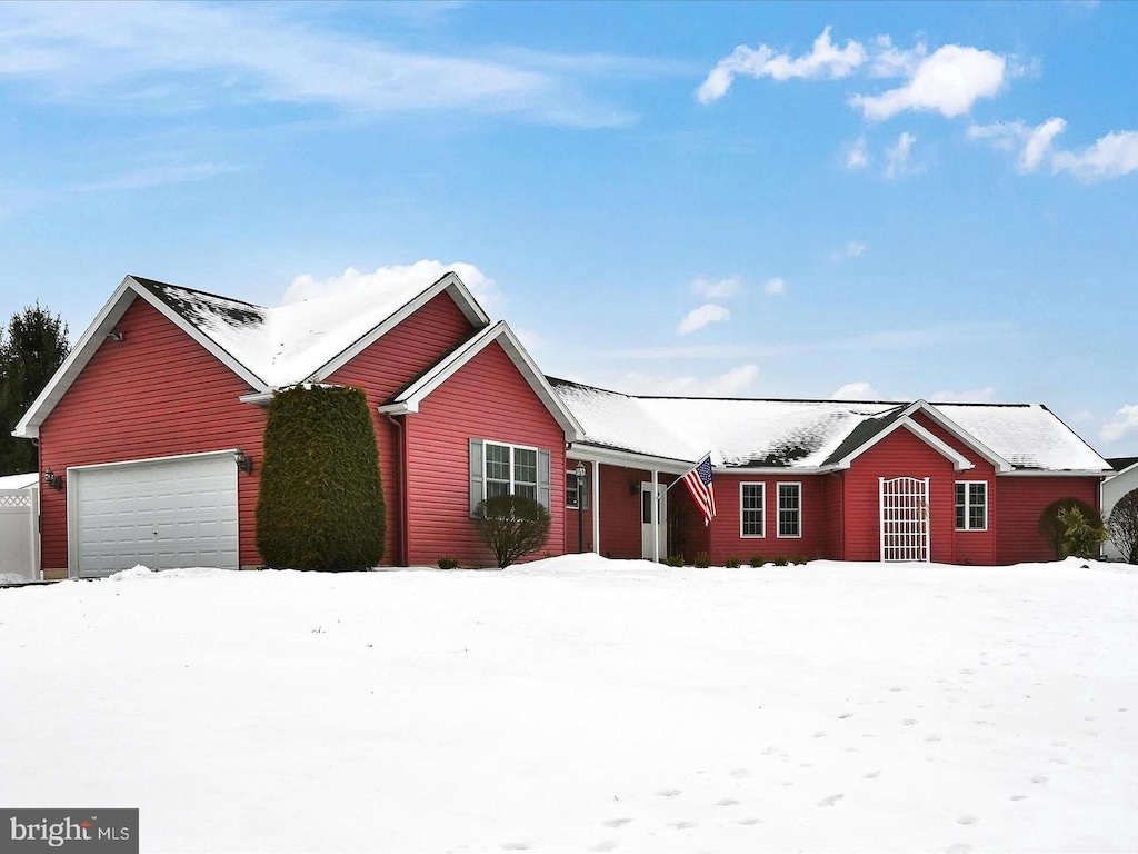 view of front of property with a garage