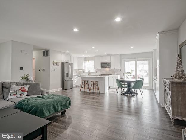 living room featuring wood-type flooring