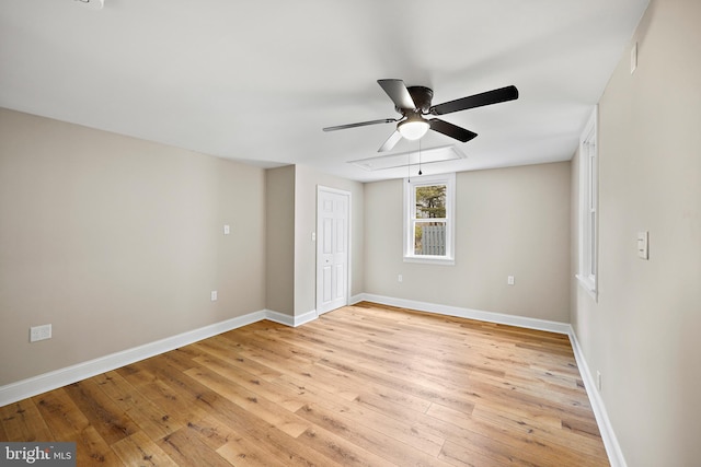 unfurnished room with light hardwood / wood-style floors