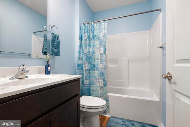 full bathroom with wood-type flooring, vanity, shower / bathtub combination with curtain, and toilet