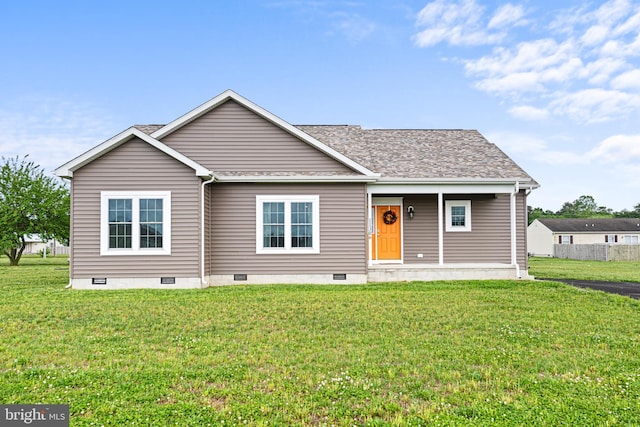 view of front of property with a front yard and covered porch