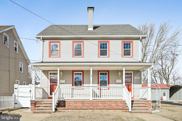 view of front facade featuring a carport and a porch