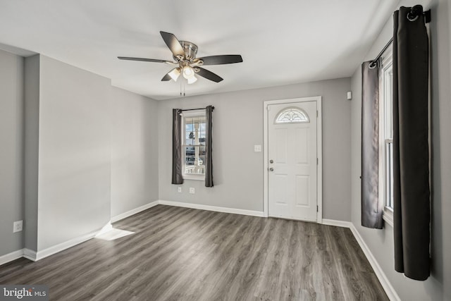 entryway featuring dark hardwood / wood-style floors and ceiling fan