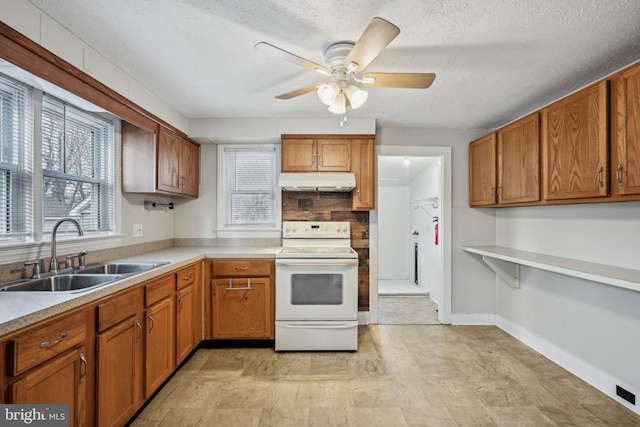 kitchen with white range with electric stovetop, sink, backsplash, ceiling fan, and a textured ceiling