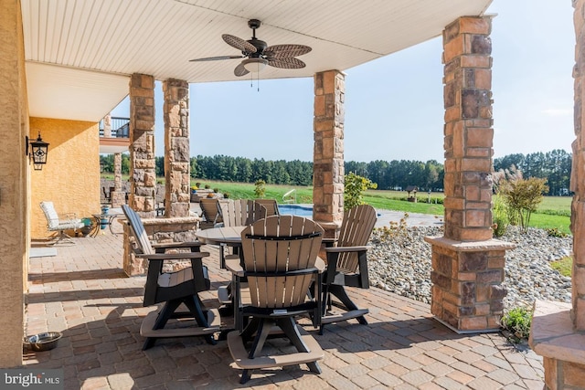 view of patio / terrace featuring ceiling fan