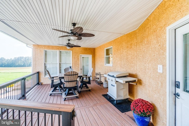 wooden terrace with ceiling fan