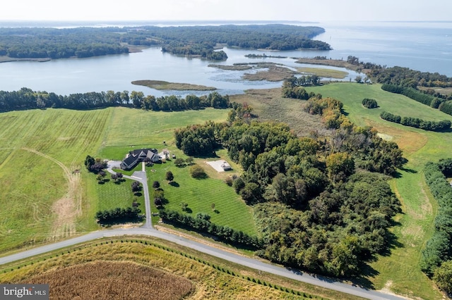 birds eye view of property with a water view and a rural view