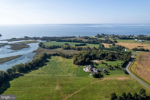 bird's eye view featuring a water view and a rural view