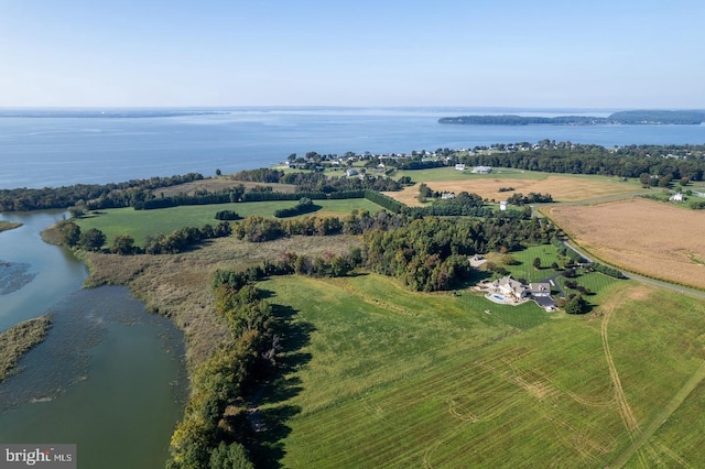 drone / aerial view featuring a water view and a rural view