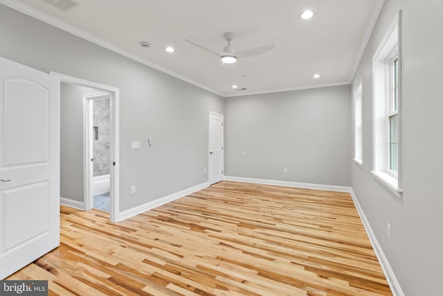 unfurnished room with recessed lighting, light wood-style flooring, baseboards, and ornamental molding