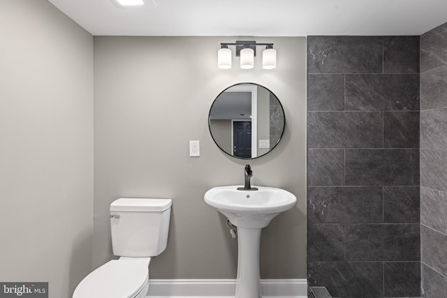 bathroom featuring toilet