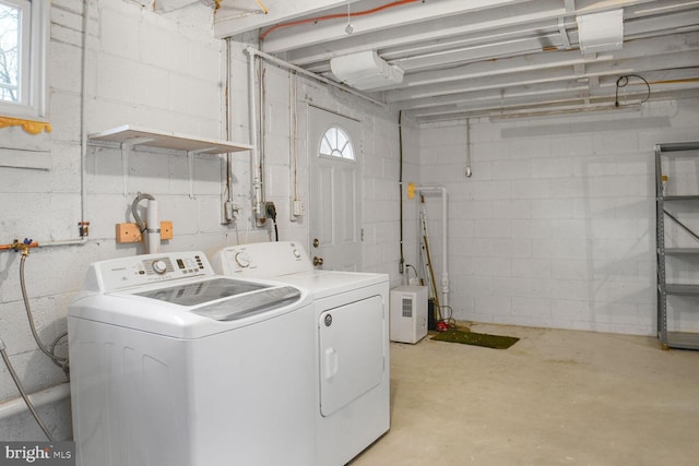 laundry area with laundry area and separate washer and dryer