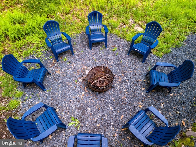 view of patio with a fire pit