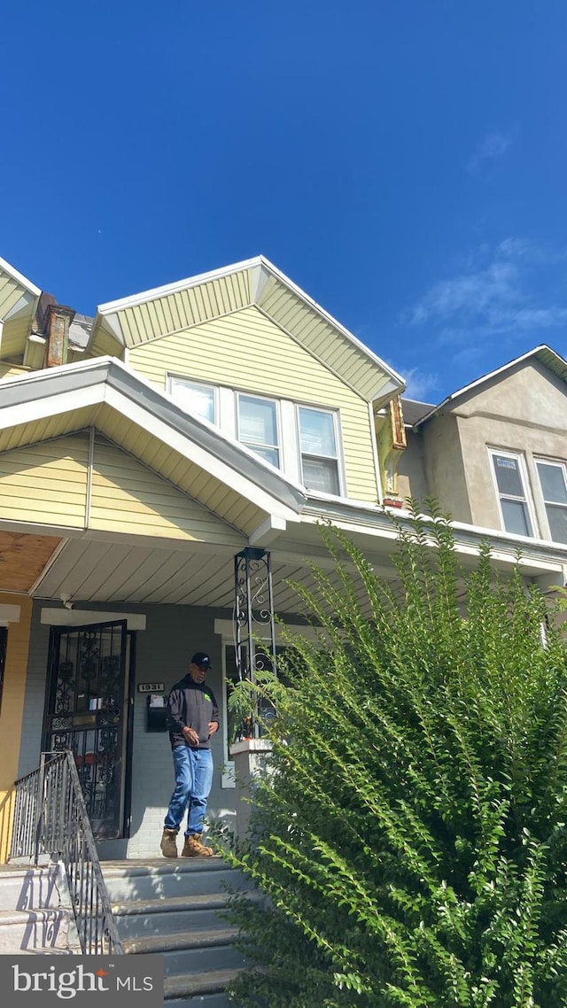 view of home's exterior featuring covered porch