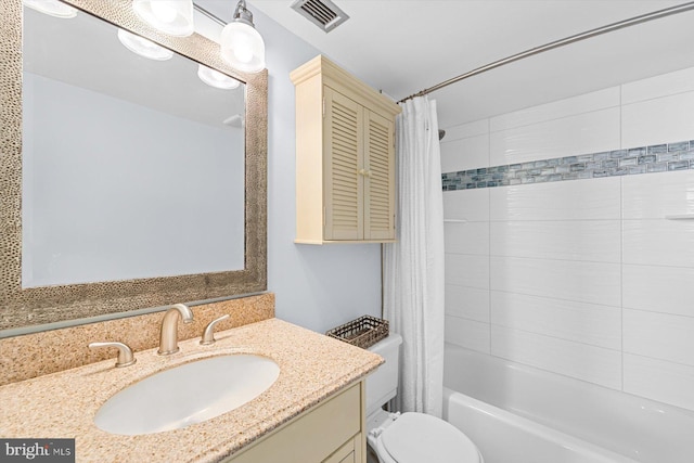 full bathroom with vanity, shower / bathtub combination with curtain, and toilet